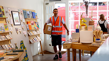 postie in a shop